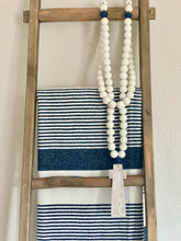 Load image into Gallery viewer, Handcrafted Painted Wooden Cross + Painted White Ocean Glass Closed Garland