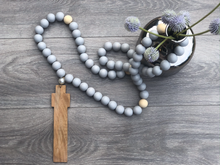 Load image into Gallery viewer, Handcrafted Wooden Cross + Cloudy Gray Painted Beads
